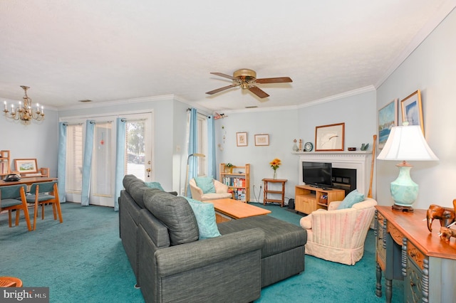 living area featuring ceiling fan with notable chandelier, carpet floors, and crown molding