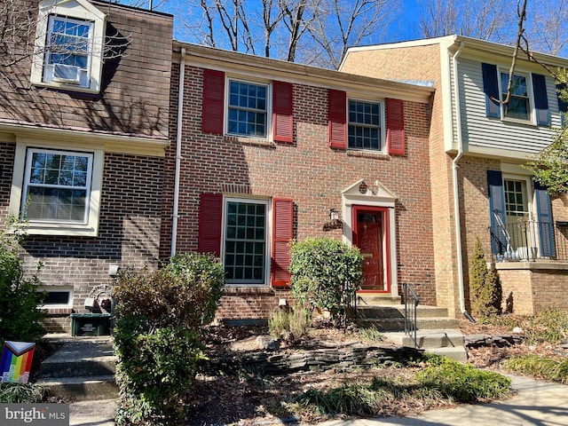 view of front of property with brick siding