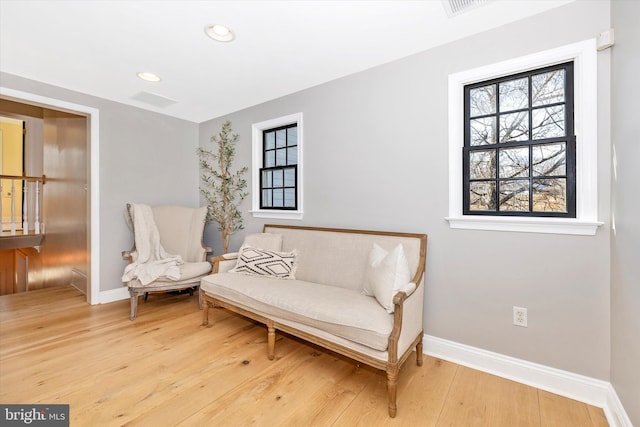 sitting room featuring recessed lighting, baseboards, and wood finished floors