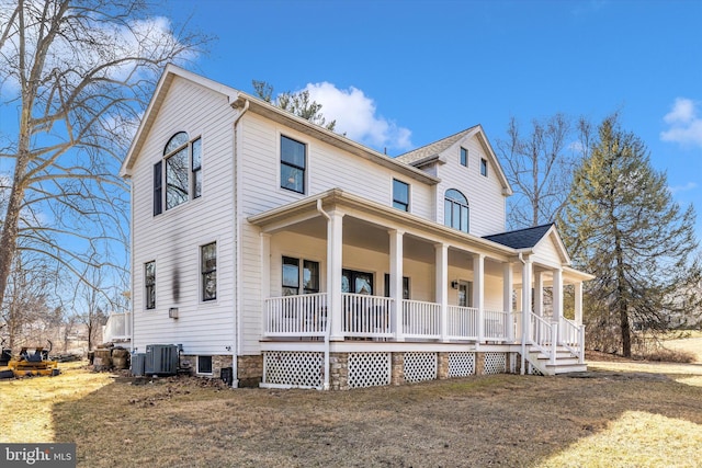 view of front of house with covered porch and central air condition unit