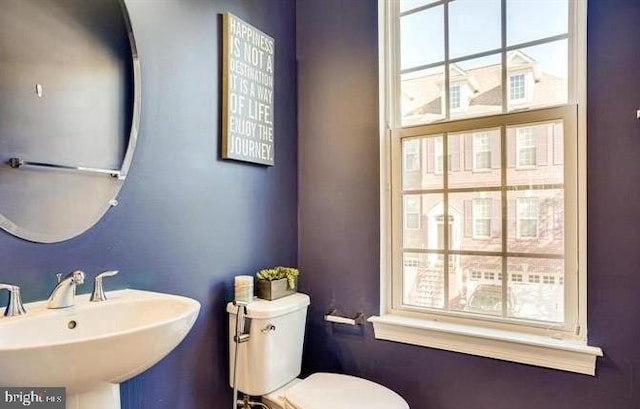 bathroom with a sink and toilet