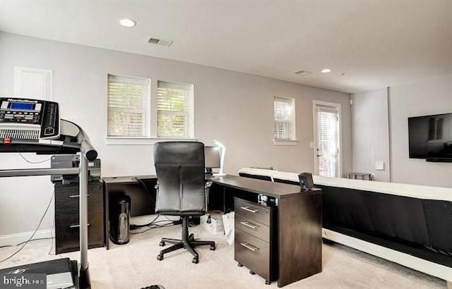 office featuring recessed lighting, visible vents, and plenty of natural light