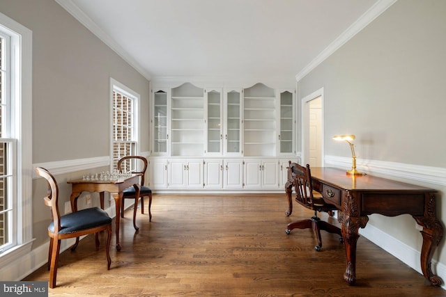 sitting room with built in features, crown molding, baseboards, and wood finished floors