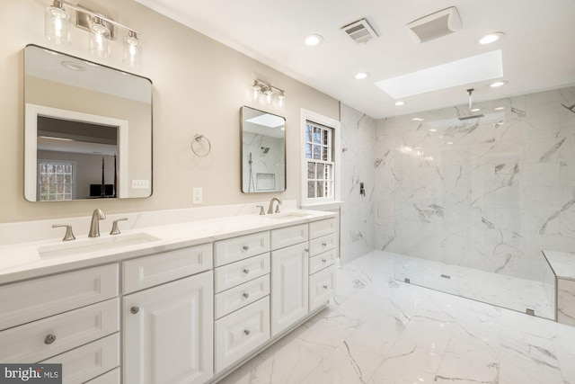 full bathroom featuring marble finish floor, a sink, visible vents, and recessed lighting