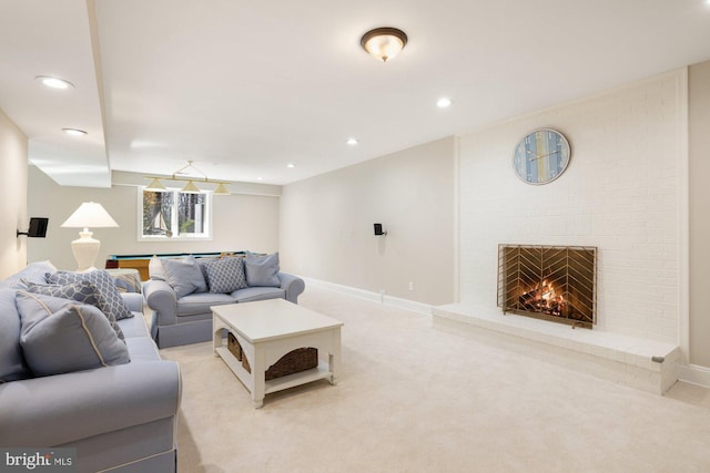 living area with light carpet, a brick fireplace, billiards, and baseboards