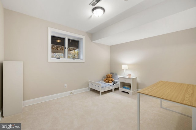 living area with carpet floors, baseboards, and visible vents