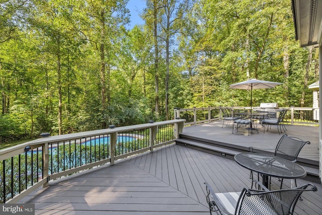 deck featuring outdoor dining space