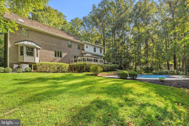 view of yard with an outdoor pool