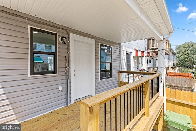 wooden deck featuring fence