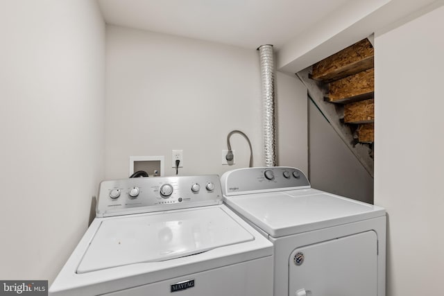 laundry room featuring laundry area and separate washer and dryer