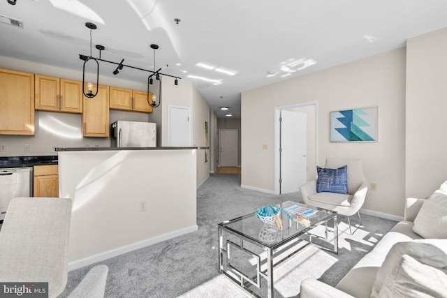 living room featuring light colored carpet, baseboards, and visible vents