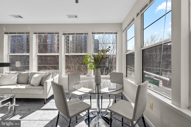 sunroom featuring visible vents