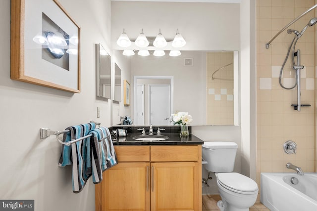 full bath with vanity,  shower combination, toilet, and visible vents