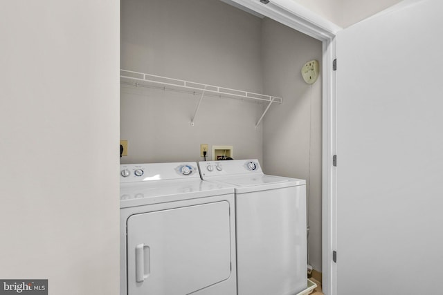 laundry area with washer and dryer and laundry area