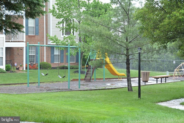 community playground featuring a yard