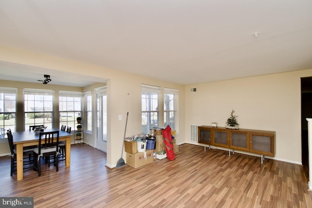 dining space featuring visible vents, plenty of natural light, and light wood-style flooring