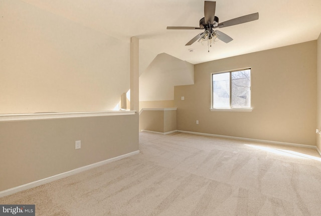 unfurnished room featuring ceiling fan, carpet, and baseboards