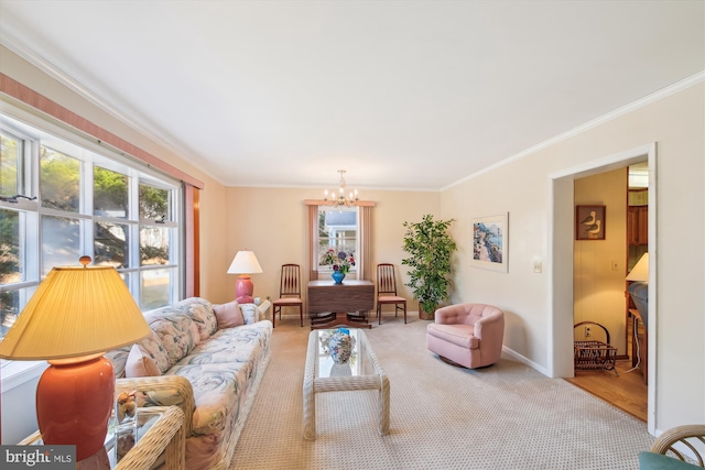 living room with a healthy amount of sunlight, an inviting chandelier, light carpet, and crown molding