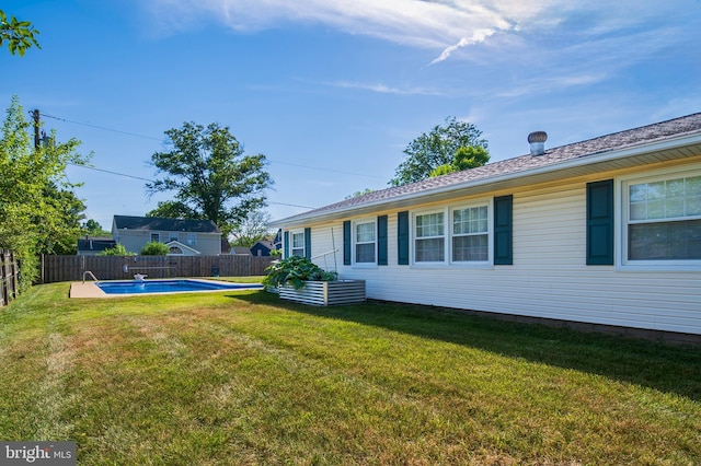 view of yard with a fenced backyard and a fenced in pool