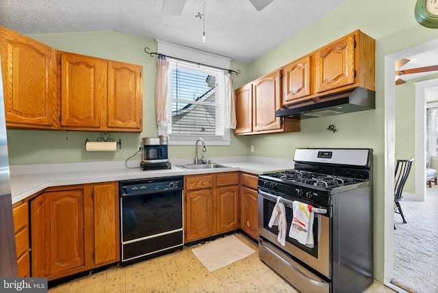 kitchen with ceiling fan, under cabinet range hood, a sink, black dishwasher, and stainless steel range with gas stovetop