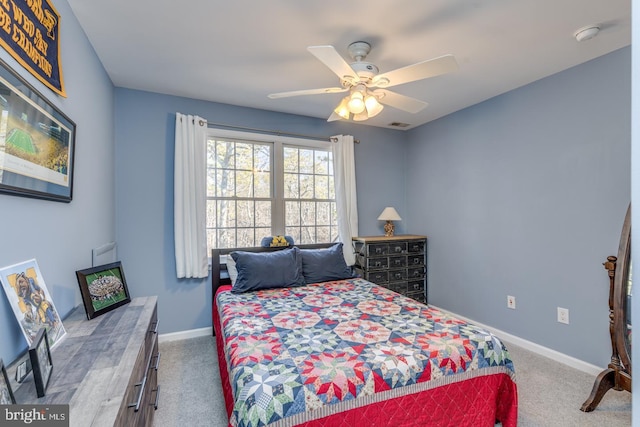 bedroom featuring a ceiling fan, carpet, visible vents, and baseboards