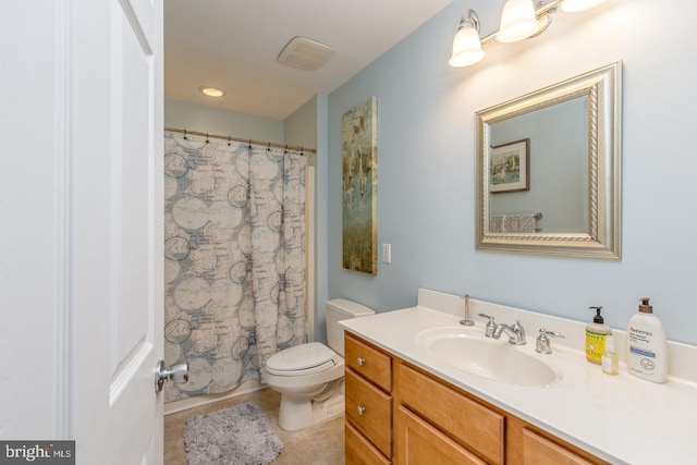 bathroom featuring toilet, a shower with curtain, tile patterned floors, and vanity