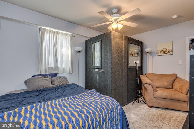 bedroom featuring carpet and ceiling fan