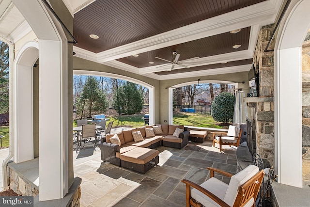 view of patio featuring outdoor lounge area, outdoor dining area, and a ceiling fan