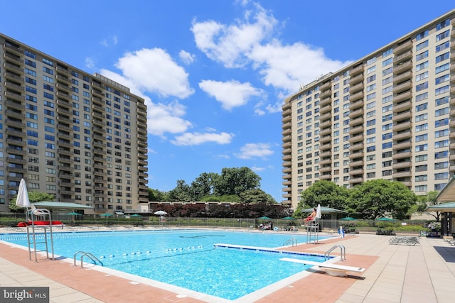 pool with a patio area