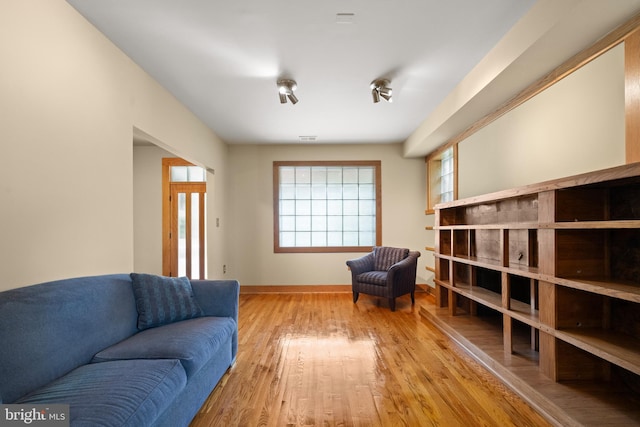 5724 4th St NW, Washington, DC 20011 - living room featuring wood finished floors and baseboards