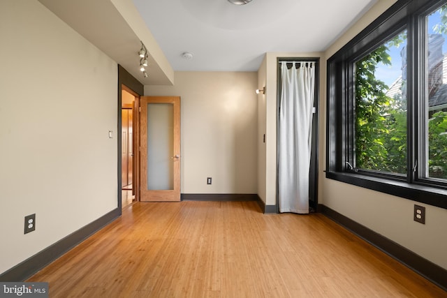 5724 4th St NW, Washington, DC 20011 - unfurnished room featuring light wood-style floors and baseboards