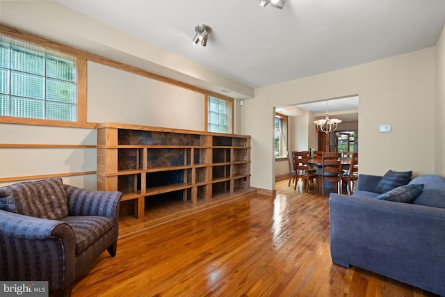 5724 4th St NW, Washington, DC 20011 - living area with a chandelier and hardwood / wood-style floors