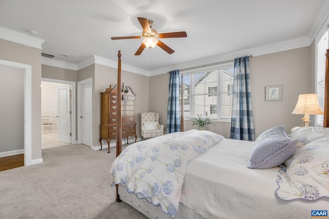 bedroom featuring ornamental molding, carpet, visible vents, and baseboards