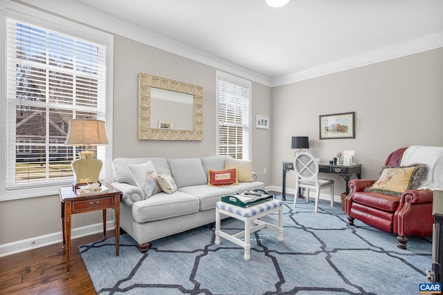 living room with ornamental molding, baseboards, and wood finished floors