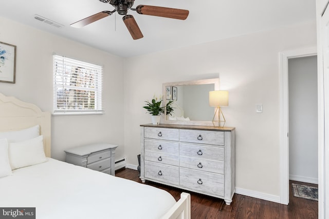 bedroom featuring a ceiling fan, dark wood finished floors, visible vents, and baseboards