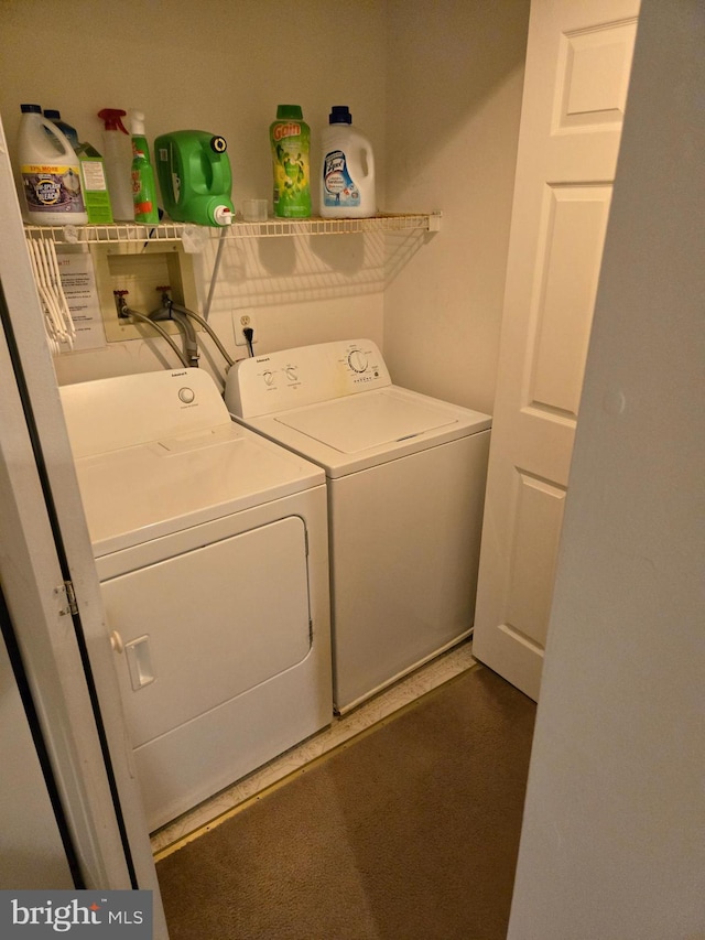 laundry area featuring laundry area and separate washer and dryer