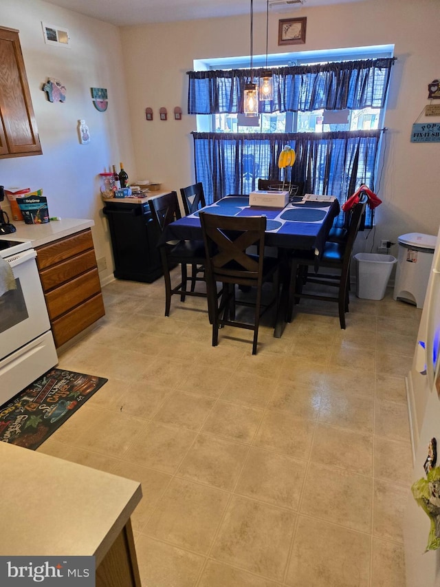 dining space with visible vents