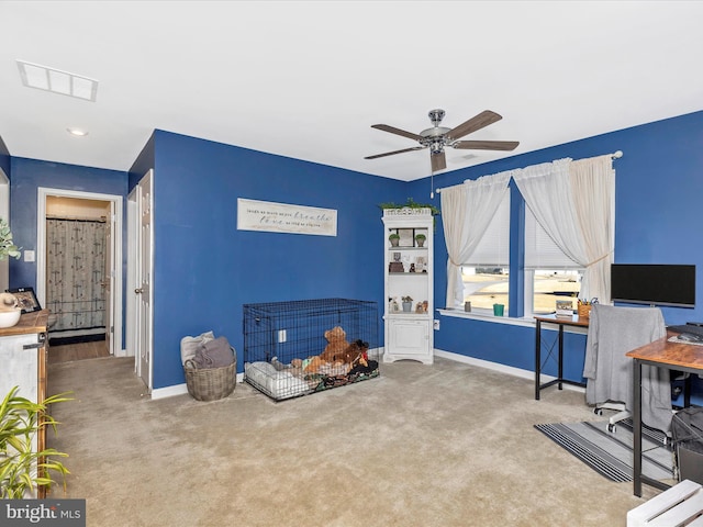 bedroom with carpet flooring, visible vents, ceiling fan, and baseboards