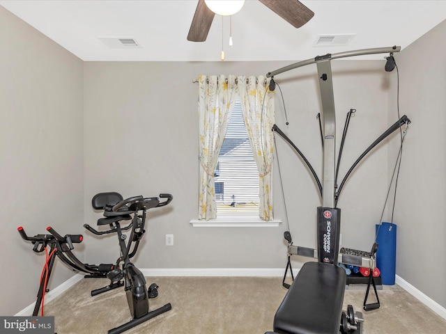 exercise area featuring ceiling fan, carpet, visible vents, and baseboards