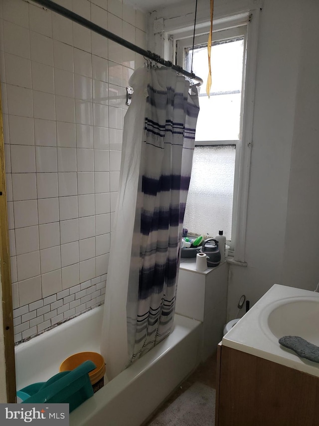 full bathroom featuring shower / tub combo and a sink