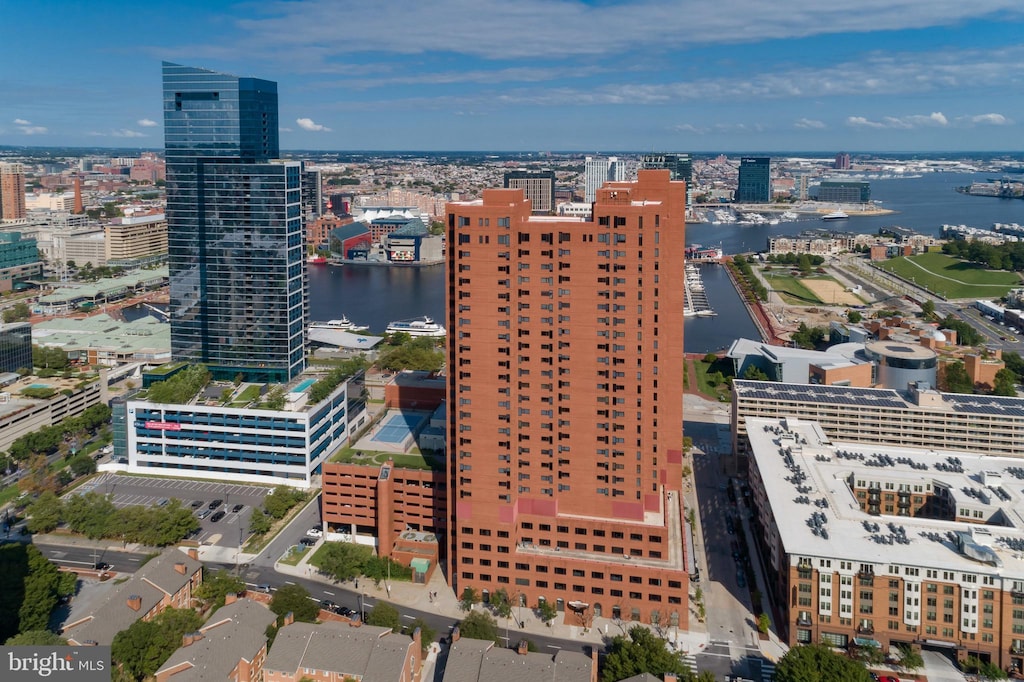 aerial view with a water view and a city view