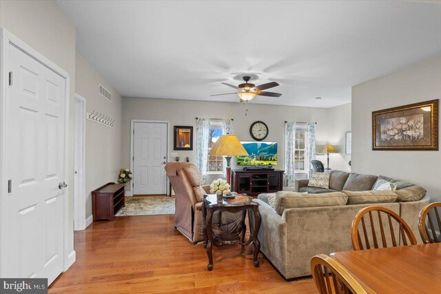 310 S 21st St, Lebanon, PA 17042 - living area with light wood-type flooring and a ceiling fan