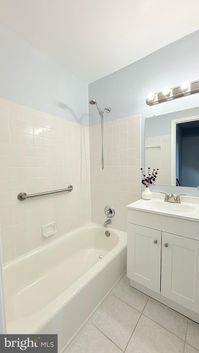 bathroom with vanity, shower / washtub combination, and tile patterned floors