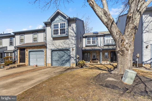 view of front of house featuring driveway and an attached garage