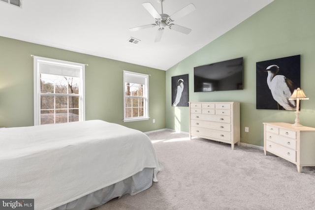 bedroom with visible vents, a ceiling fan, carpet flooring, baseboards, and vaulted ceiling