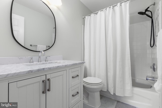 bathroom with vanity, shower / bath combination with curtain, and toilet