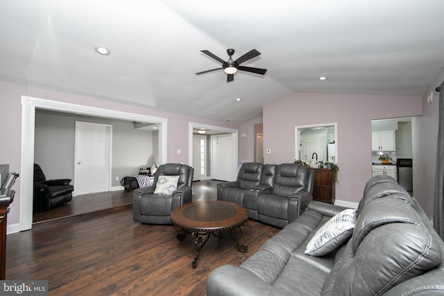 living area with recessed lighting, ceiling fan, vaulted ceiling, wood finished floors, and baseboards