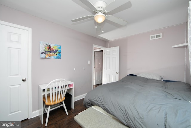 bedroom featuring a ceiling fan, baseboards, visible vents, and dark wood-style flooring