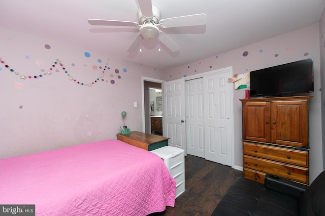 bedroom featuring ceiling fan, a closet, and wood finished floors