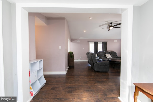 living area featuring ceiling fan, recessed lighting, dark wood-style flooring, baseboards, and vaulted ceiling